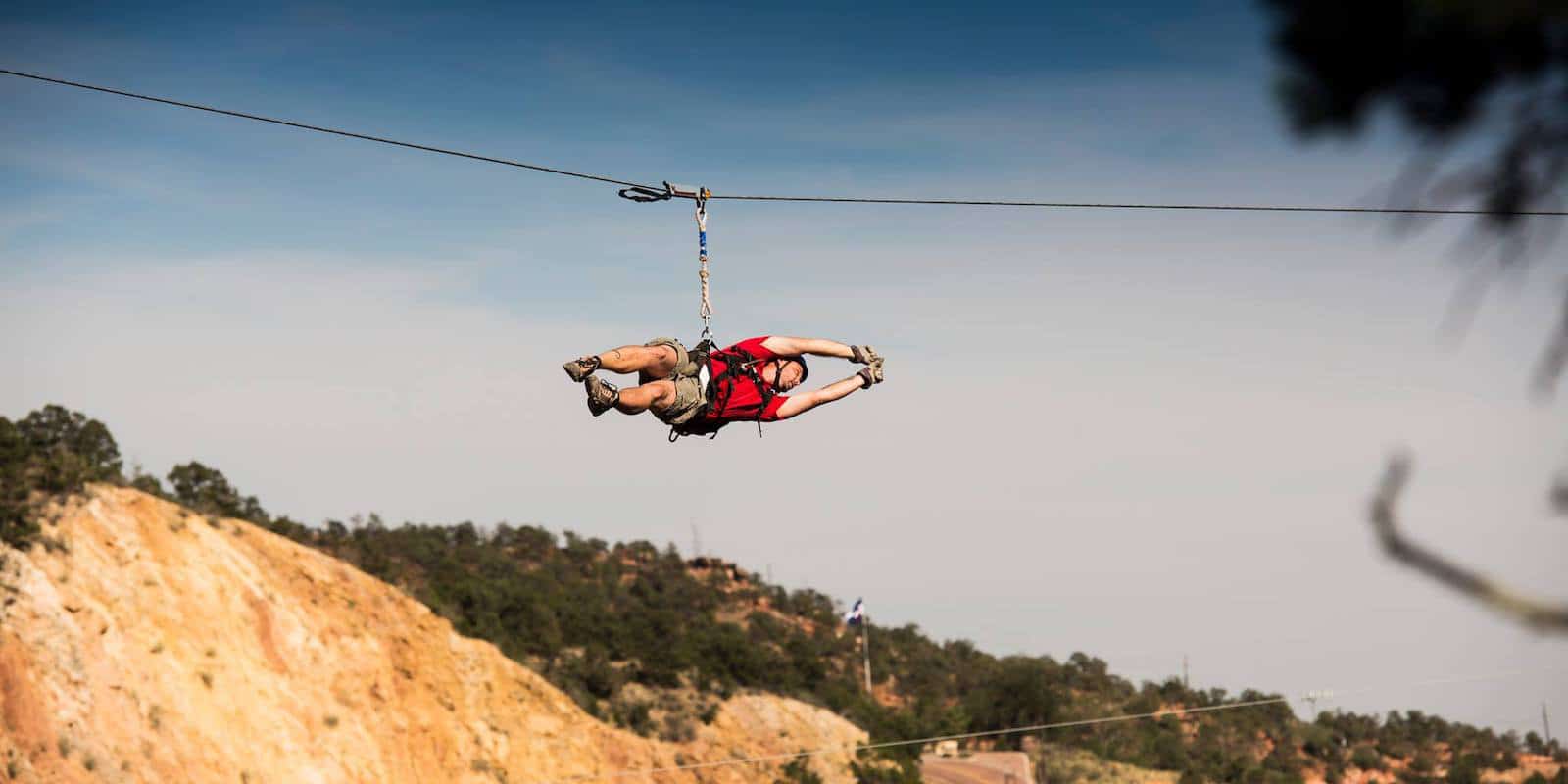 Image of a person on a zipline with Adventures Out West