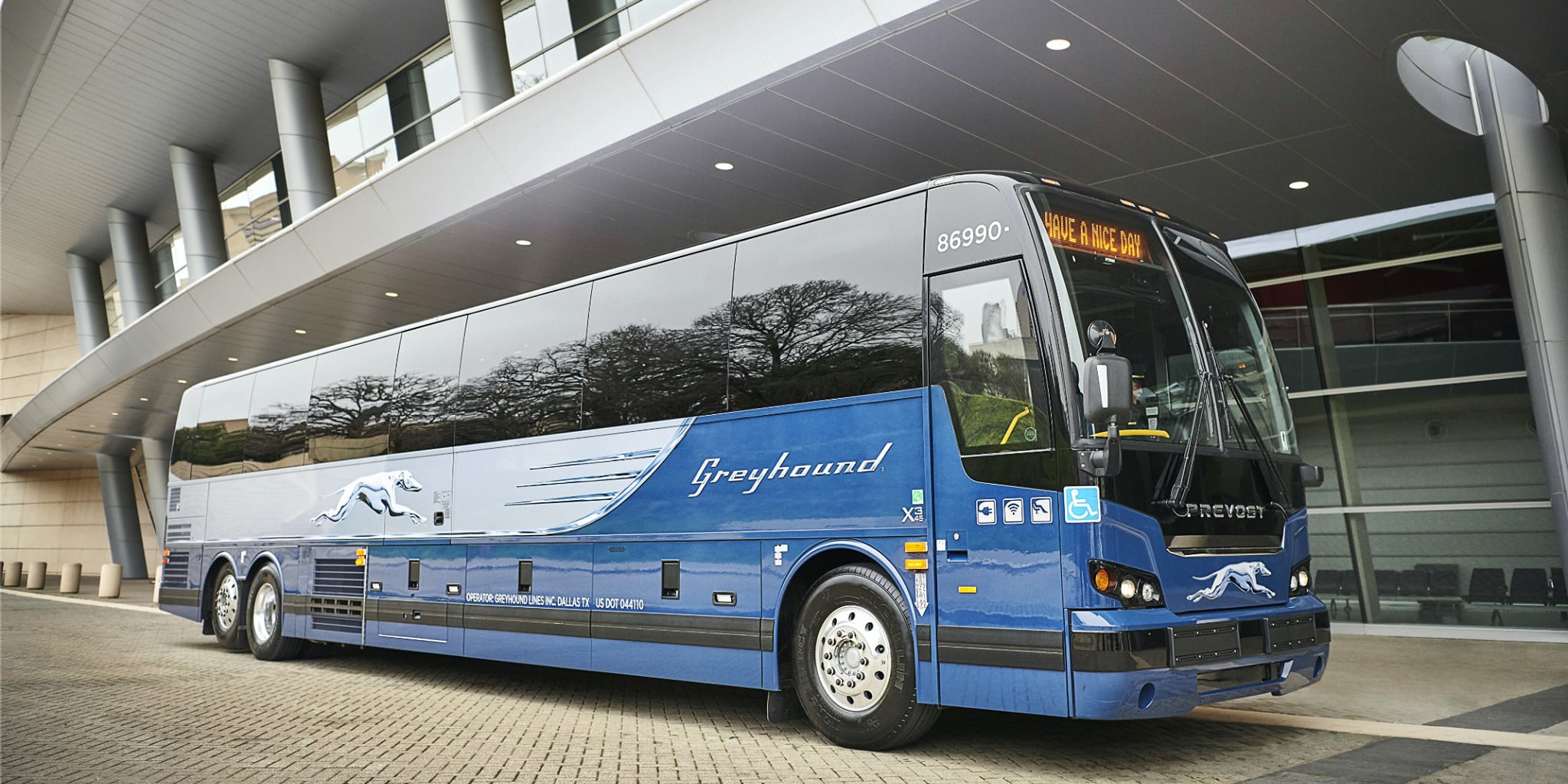 Blue greyhound bus in front of station in Denver