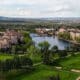 Aerial view of the golf course, lake, hotel and other facilites at The Broadmoor